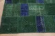 Paars patchwork vloerkleed 248cm x 175cm kleed heeft klein gaatje op de naad